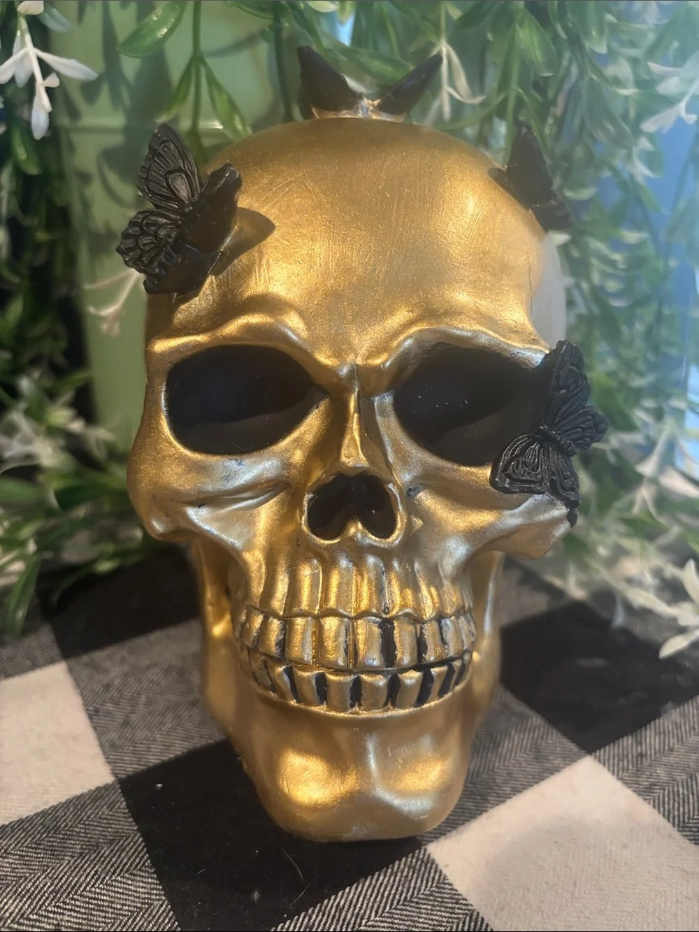 Gold Decorative Skull with Black Butterfly Accents